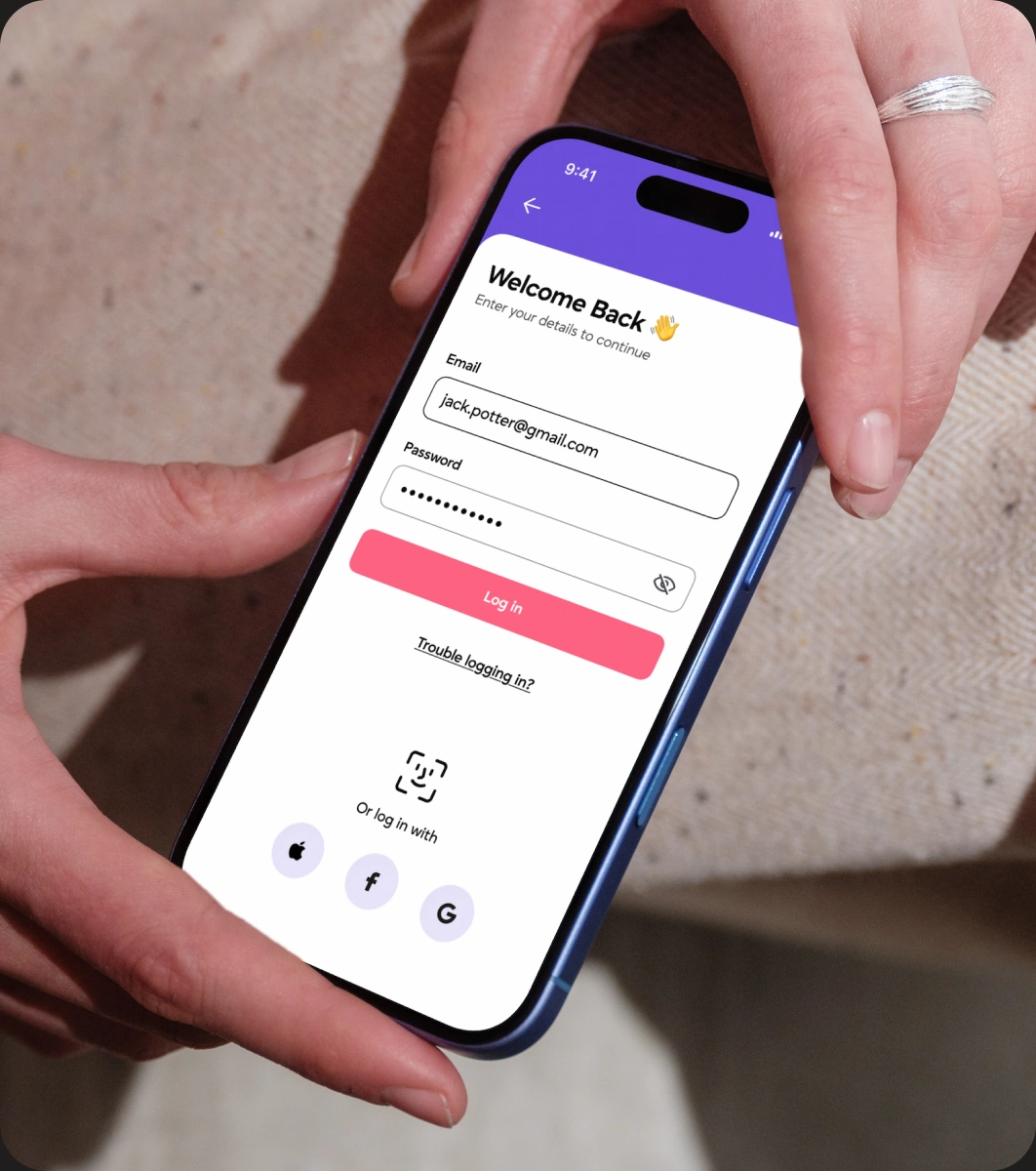 A woman checking the AVVO investment app on her phone