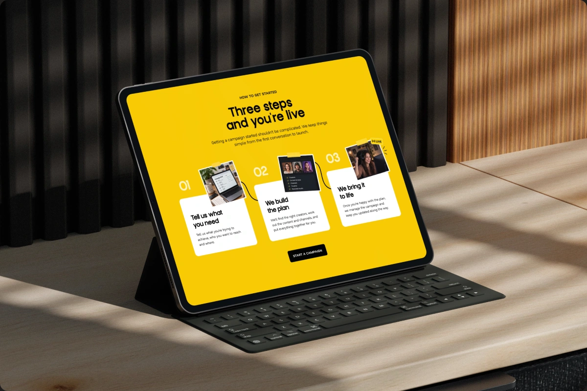Miela website displayed on an iPad on a modern desk